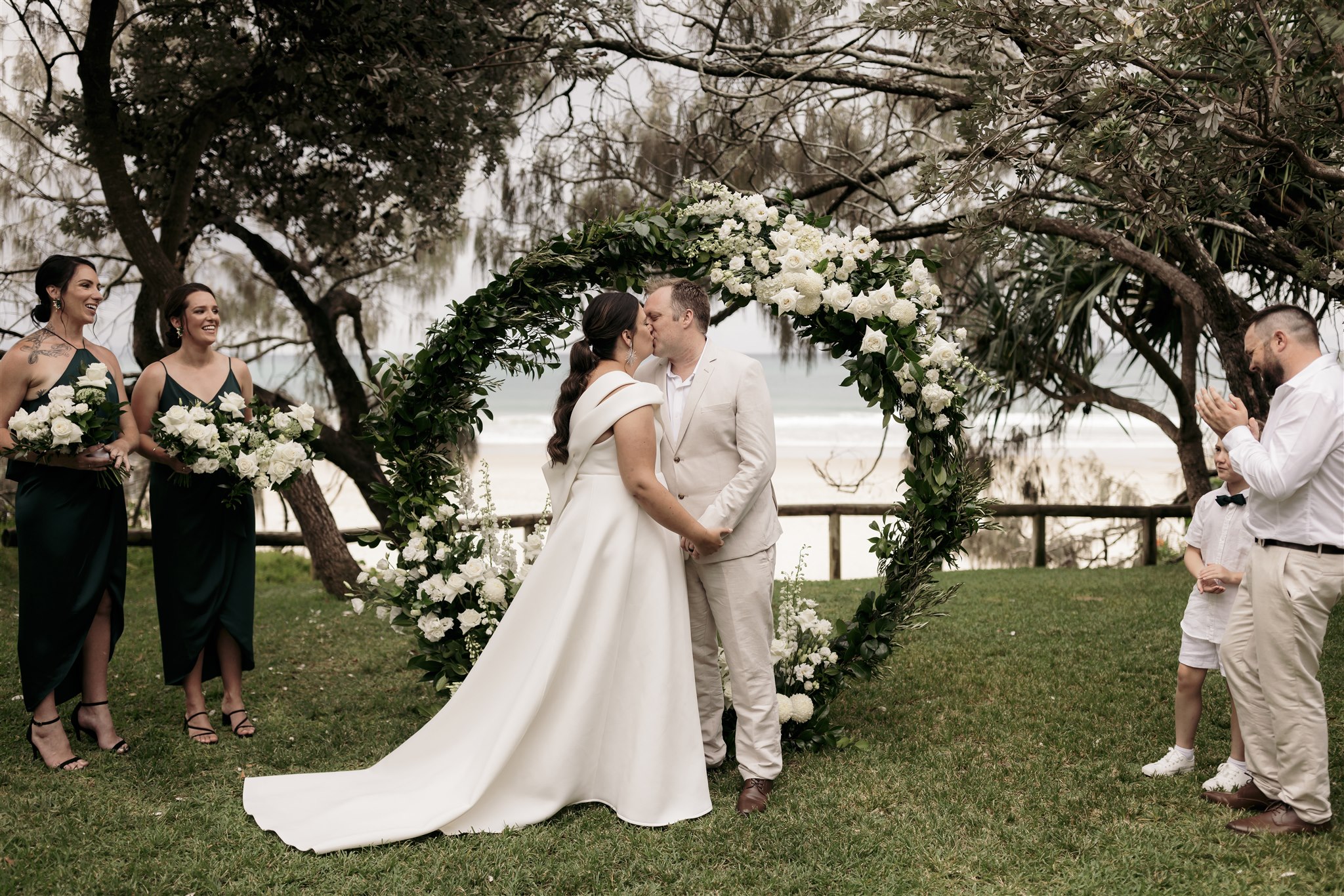 All white blooms with touches of lush green foliage