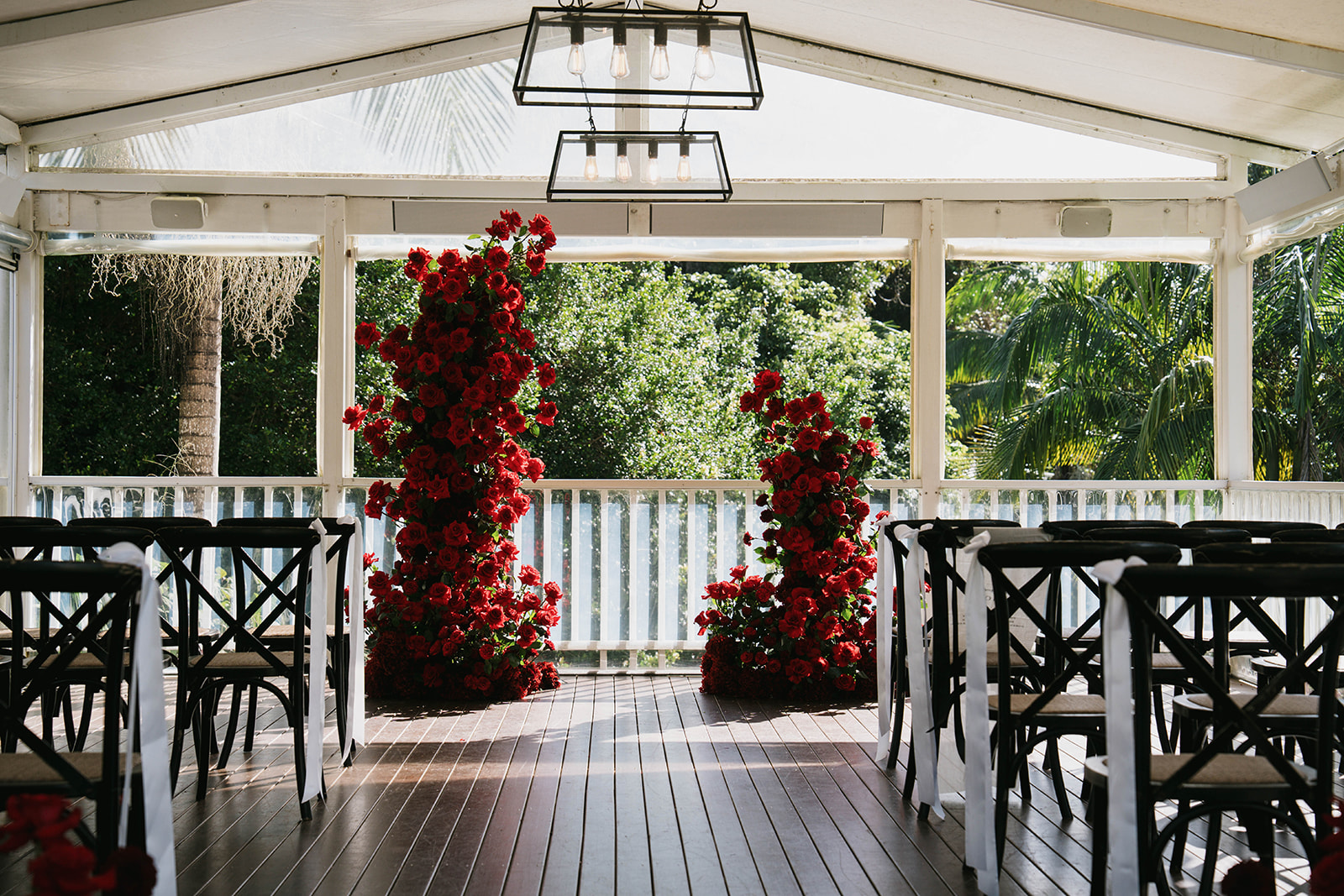 Moody red rose wedding flowers